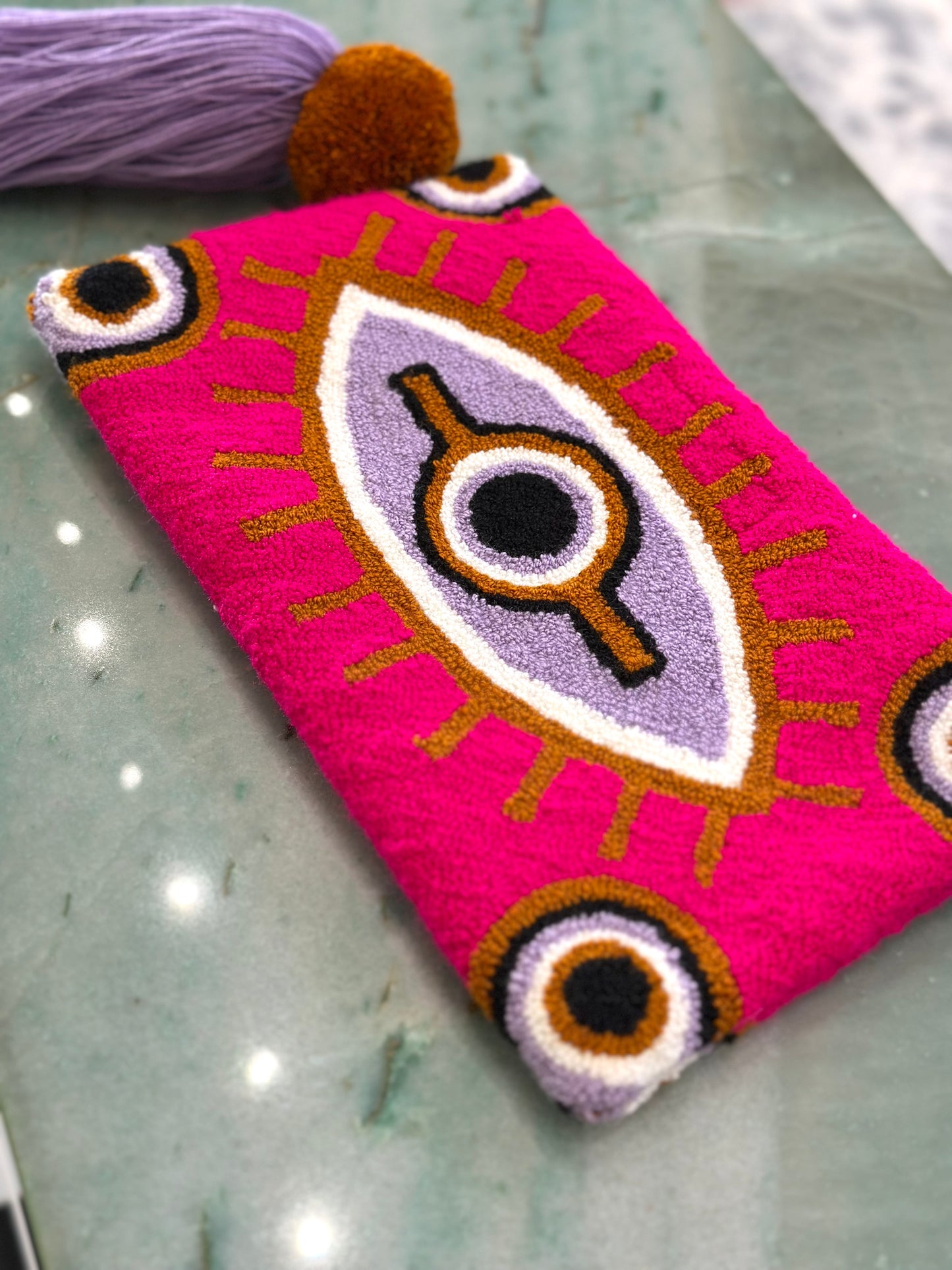 Evil eye clutch