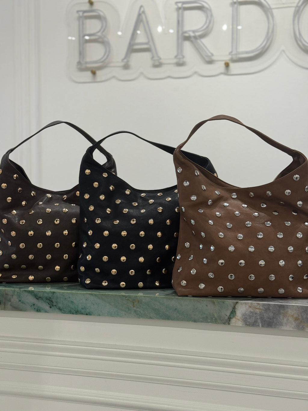 Studded carryall bags