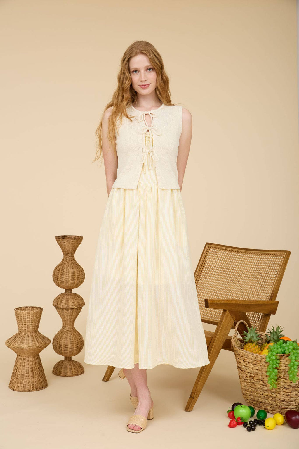 RAW EDGE FRONT TIE SLEEVELESS KNIT CARDIGAN