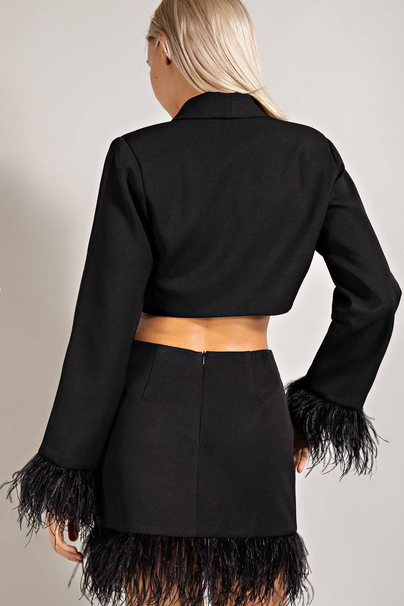 MINI SKIRT W/ FEATHER TRIM & HIDDEN BACK ZIPPER CLOSU